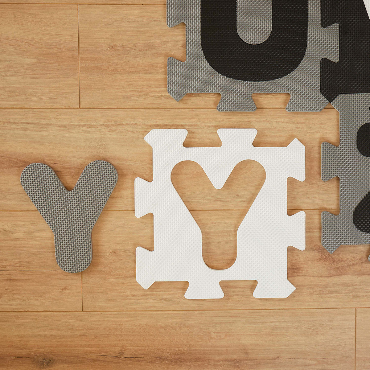 Tapis puzzle lettres black & white